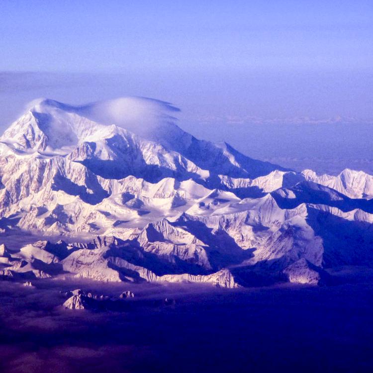 Denali stands at 20,310 feet as seen from a commercial flight between Anchorage and Fairbanks. Photo by Ned Rozell.