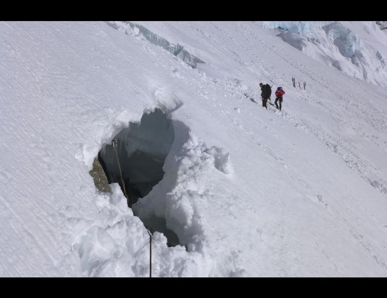 Peter Haeussler emerged from this hole in the Kahiltna Glacier after falling into a crevasse during a rock-gathering mission in 2014. Photo by Peter Haeussler.