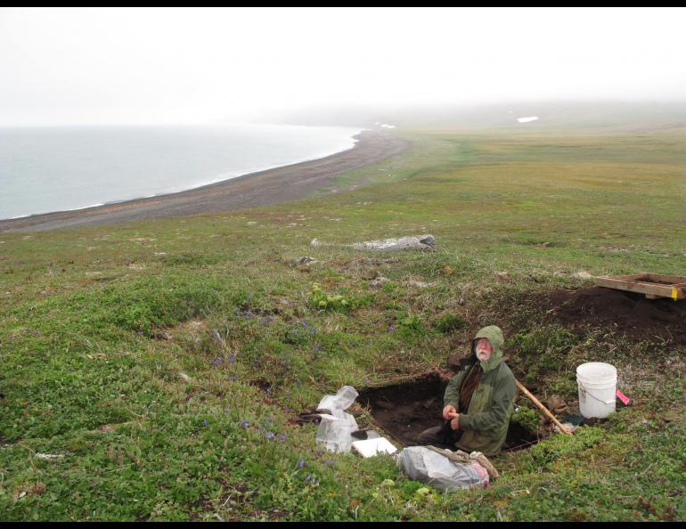 In August 2012, Dennis Griffin examines "the Pottery House" on St. Matthew Island, the land farthest from a village in Alaska. Ned Rozell photo.