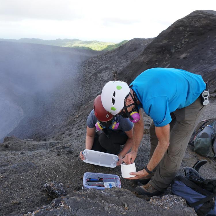 GI researcher David Fee and graduate student Alex Iezzi deploy an infrasound sensor on the active Yasur Volcano, Vanuatu. Photo by Robin Matoza, University of California Santa Barbara.