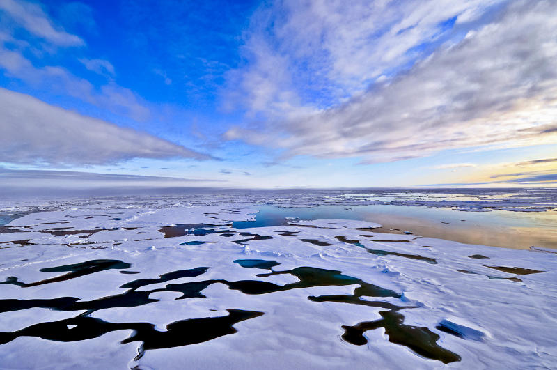 Arctic Ocean with ice ontop with spots of visible ocean