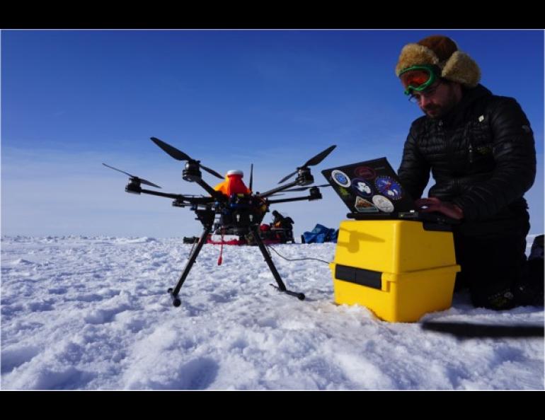 Eyal Saiet, a researcher with the Alaska Center for Unmanned Aircraft Systems Integration, works with the Ptarmigan unmanned aircraft in Barrow, Alaska.