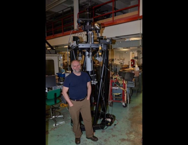 Mark Conde, a space physicist at UAF’s Geophysical Institute, stands next to the scanning Doppler imager. Conde thought up the device, which is heading to Antarctica. Photo courtesy of Mark Conde.