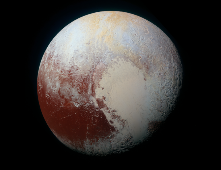 This high-resolution, enhanced color view of Pluto was taken on July 14, 2015. Photo by NASA.