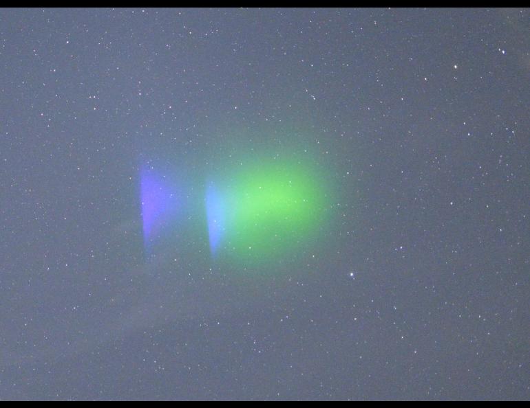 Glowing clouds created by the release of barium into the ionosphere. Photo: Don Hampton, Geophysical Institute