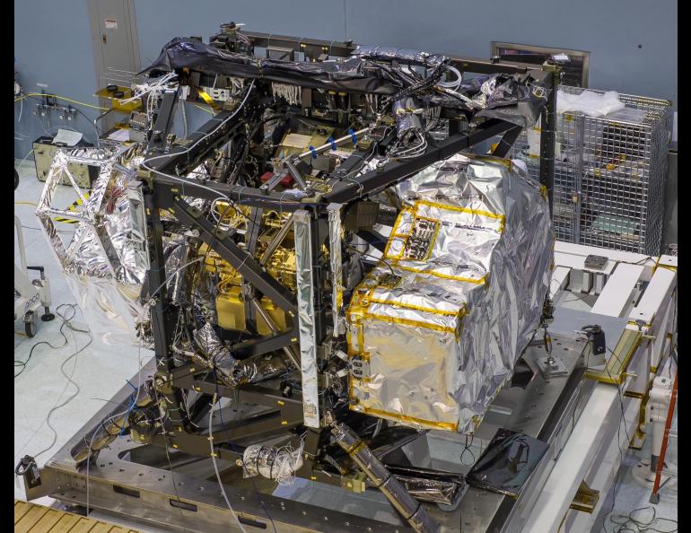 The Near Infrared Spectrograph, the large silver mass at right, is one of four science instruments in the Webb telescope's Integrated Science Instrument Module, pictured here in NASA's Goddard Space Flight Center in Greenbelt, Maryland. Photo by Chris Gunn/NASA