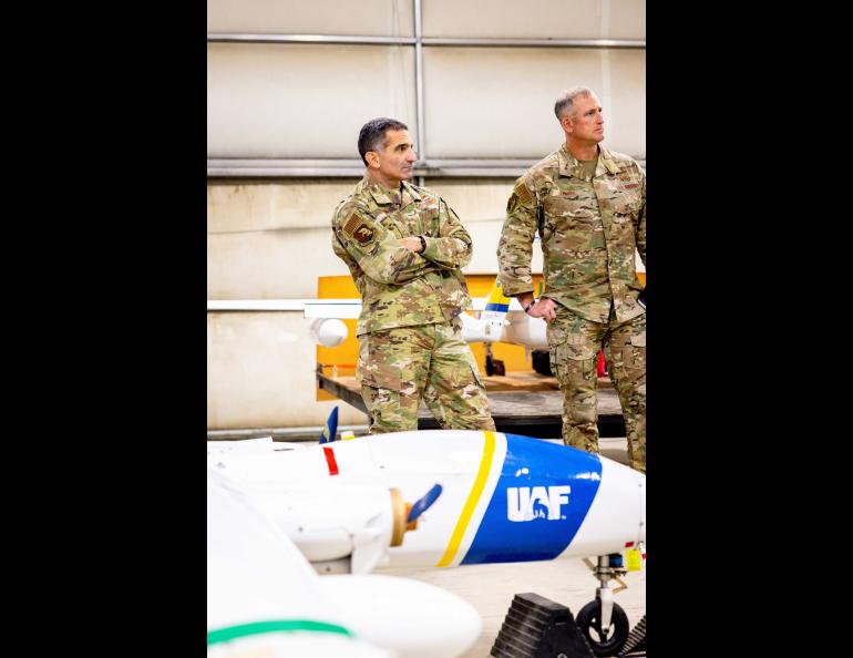 Air Force Lt. Gen. David Nahom, left, commander of the Alaskan Command, visited the hangar of the Alaska Center for Unmanned Aircraft Systems Integration as part of a Geophysical Institute tour on Aug. 30. Nahom oversees all military forces in Alaska. UAF/GI Photo by Courtney Holtzclaw.