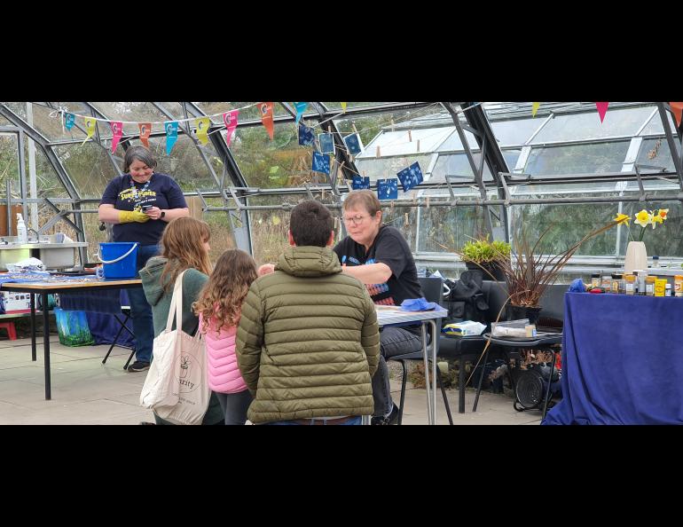 Jane Essex, right, works with children at St. Andrews Botanic Gardens in St. Andrews, Scotland. At left is Essex’s colleague, Kirsty Ross. Photo courtesy of Jane Essex