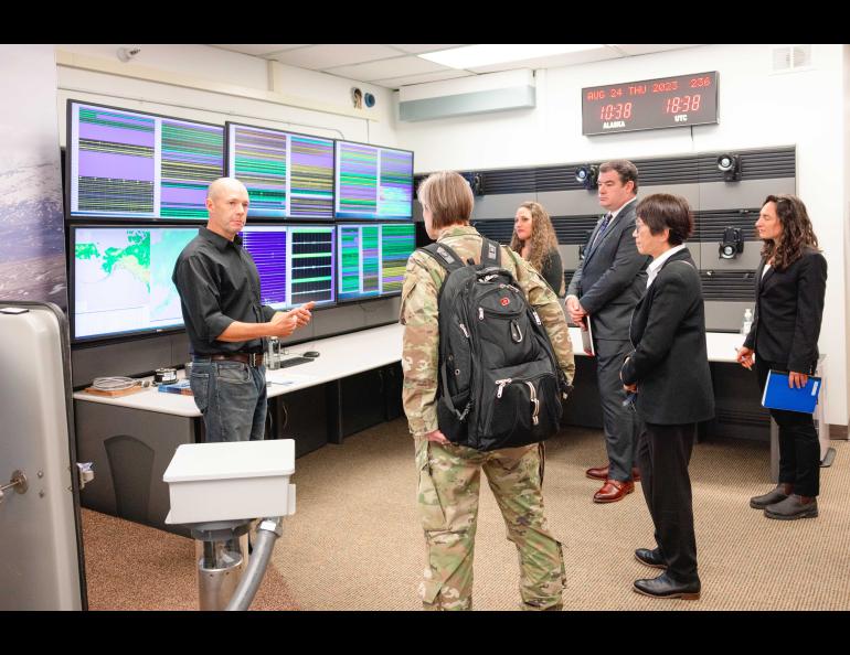 Alaska Earthquake Center Director Michael West explains the center’s operations to a tour group headed by U.S. Undersecretary of Defense Heidi Shyu on Aug. 24. UAF/GI Photo by Courtney Holtzclaw.