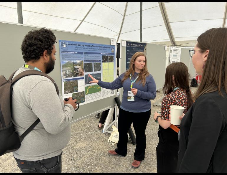 Graduate student Emily Graham shows her work about rusted rivers at the International Conference on Permafrost in Whitehorse, Yukon, on Monday, June 17, 2024. Photo by Rod Boyce