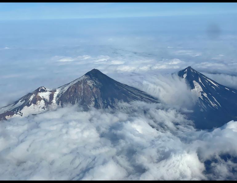 Pavlof Volcano, on the Alaska Peninsula, emerges from clouds on Aug. 20, 2021. Photo courtesy of Ben David Jacob.