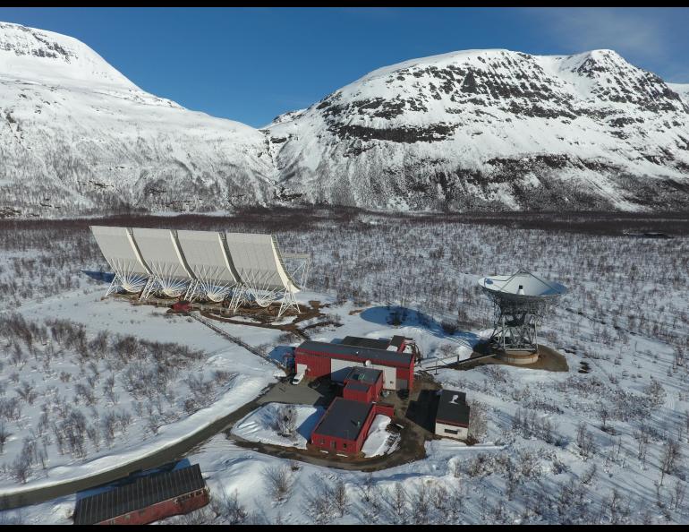 This April 2016 photograph shows two incoherent scatter radar antennas of the Ramfjordmoen, Norway, EISCAT site. Photo courtesy Craig Heinselman