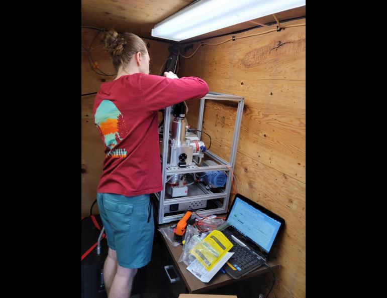 UAF student James Campbell maintains an instrument that would later be used in the 2022 Fairbanks air quality research campaign. The instrument belongs to Georgia Tech and was brought to Fairbanks temporarily. It is similar to an instrument UAF will buy. Photo courtesy of Jingqiu Mao