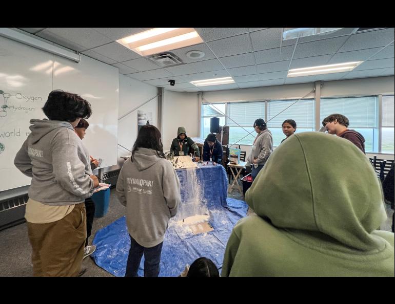 Elementary and middle school students conducting an ‘Avalanche Demonstration’ at the 2024 BARC Science and Culture Fair. Photo by Serina Wesen