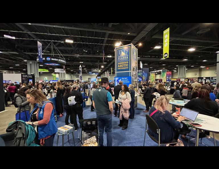 Busy, busy at the UAF booth. Photo by Rod Boyce