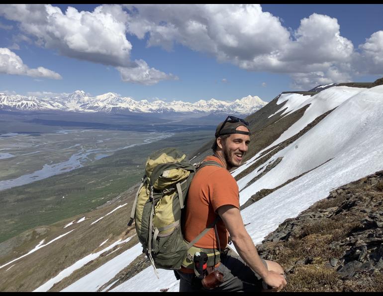 Associate professor Sean Regan pauses above Valdez Creek in Southcentral Alaska in June 2020 while researching the Denali Fault. Photo courtesy of Sean Regan