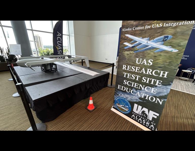 Aircraft from the UAF Alaska Center for Unmanned Aircraft Systems Integration sit on display at the 2023 Global Autonomous Systems Conference in Anchorage. Photo by Rod Boyce