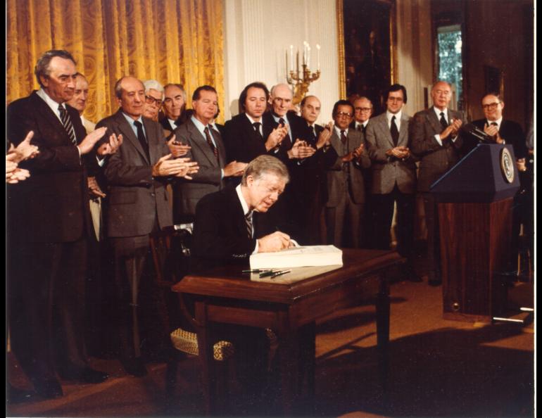 President Jimmy Carter signs the Alaska National Interest Lands Conservation Act on Dec. 2, 1980. Photo courtesy of the Jimmy Carter Presidential Library.