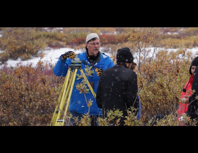 Jeff Freymueller works with GPS equipment at Chandalar Shelf in the Brooks Range in late August 2015. Photo by John Farrell.