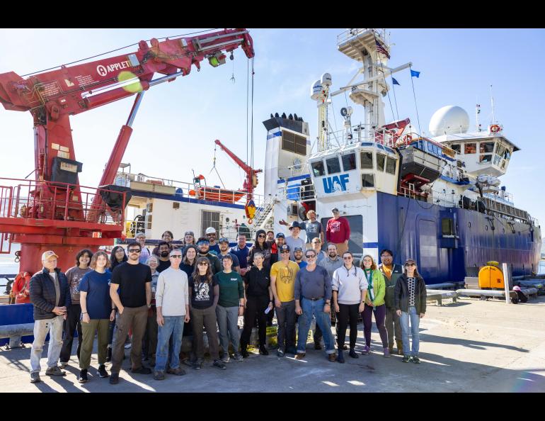 Researchers and crew members pose beside the University of Alaska Fairbanks research ship Sikuliaq in Dutch Harbor during a 2023 cruise to the Bering Sea to learn more about the Bering Land Bridge. Photo by JR Ancheta.