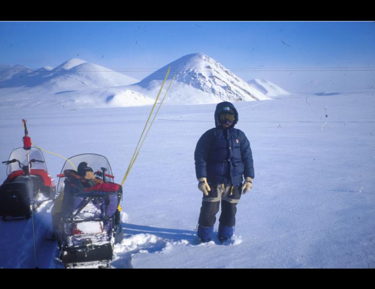  Glen Liston of Colorado State University pauses during a snowmachine trek to the Mesa Site on Alaska's north slope. Liston, Matthew Sturm of Fairbanks, and four others will attempt a snow-sampling trip from Nome to Barrow in spring 2002. photo by Matthew Sturm. 