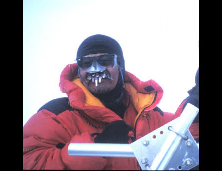 Yoshitomi Okura works on a weather station at 18,733 feet on Mt. McKinley. In June 2004 he will return with a team of climbers from Japan and from UAF in an attempt to repair the station. Photo by Ned Rozell. 