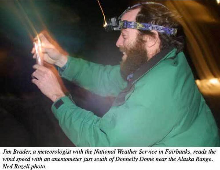  Jim Brader, a meteorologist with the National Weather Service in Fairbanks, reads the wind speed with an anemometer just south of Donnelly Dome near the Alaska Range. Ned Rozell photo. 