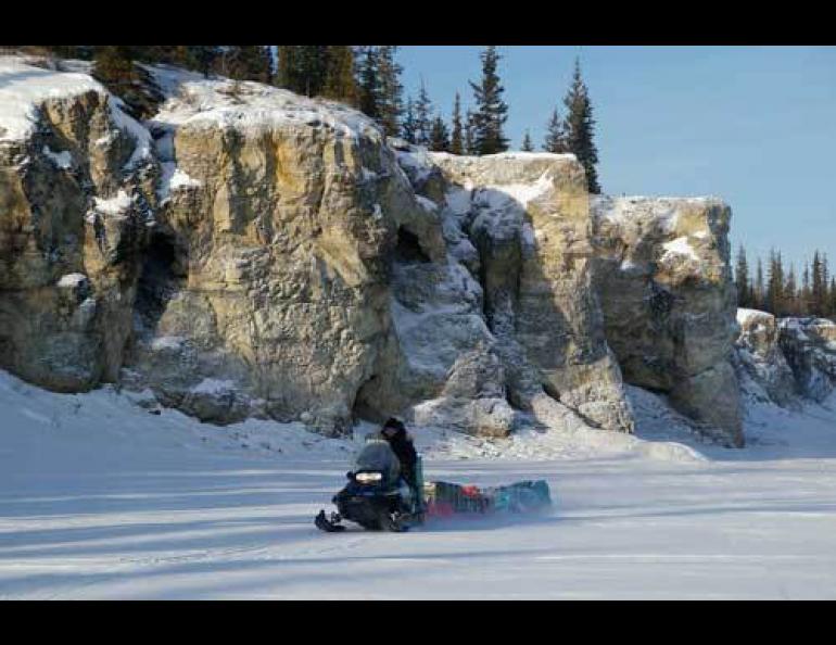  Dan Solie heads toward Old Crow up the Porcupine River during a long scientific traverse in Spring 2007. Photo by Henry Huntington. 