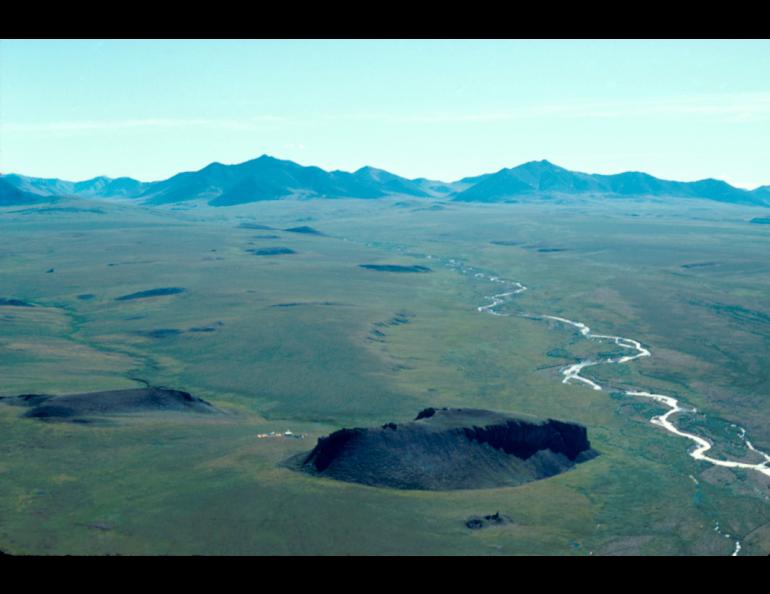 The Mesa Site rises just north of the Brooks Range in northern Alaska. Photo by Mike Kunz.