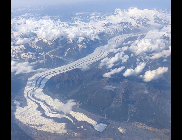 The Klutlan Glacier flows into the Yukon from Alaska’s Mount Bona, the highest peak in the photo, and Mount Churchill, the high ridge to the right of Bona. Image courtesy the Alaska Volcano Observatory/Alaska Division of Geological and Geophysical Surveys.