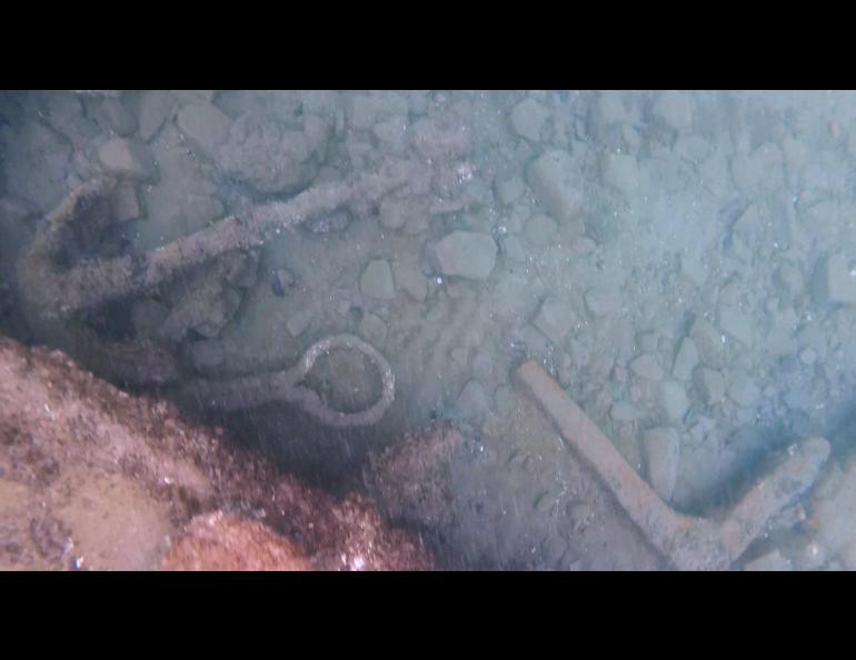 Researchers with NOAA’s Office of National Marine Sanctuaries in Woods Hole, Mass., discovered this anchor, chain plate (the metal loop) and an iron knee, likely part of a ship’s frame, on a 2015 search for remains of a whaling fleet lost off northern Alaska in 1871. Photo courtesy NOAA.