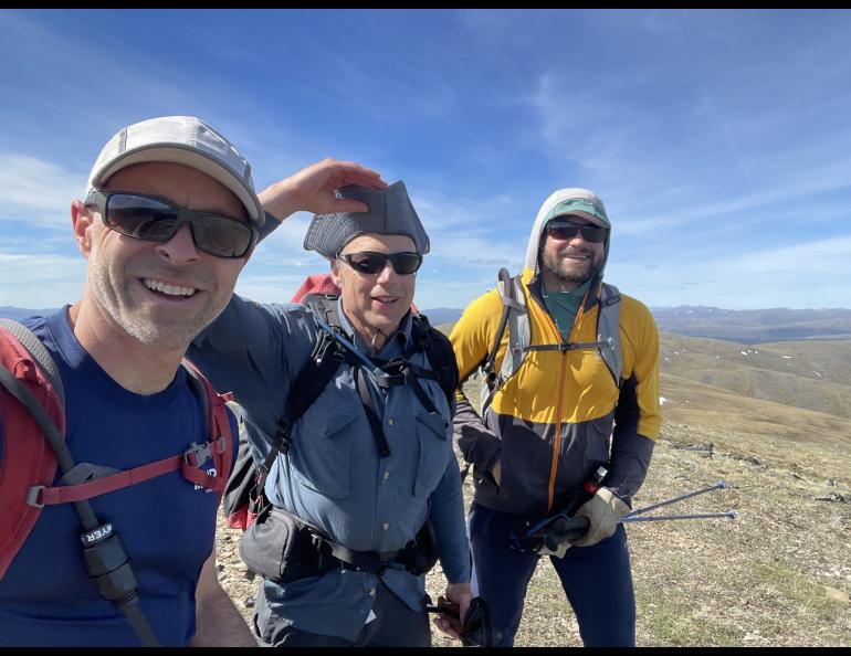 Bruno Grunau, Ned Rozell and Forest Wagner hike a ridgetop near Mastodon Dome in the AlaskAcross 2024, a 50-mile race. Photo by Bruno Grunau.