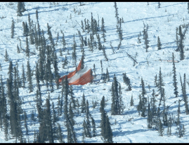 A parachute and a rocket payload as seen from a small aircraft over northern Alaska the same day the rocket launched from Poker Flat Research Range in Chatanika, Alaska, 170 miles away.