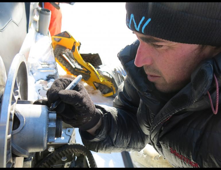 A scientist using equipment. 