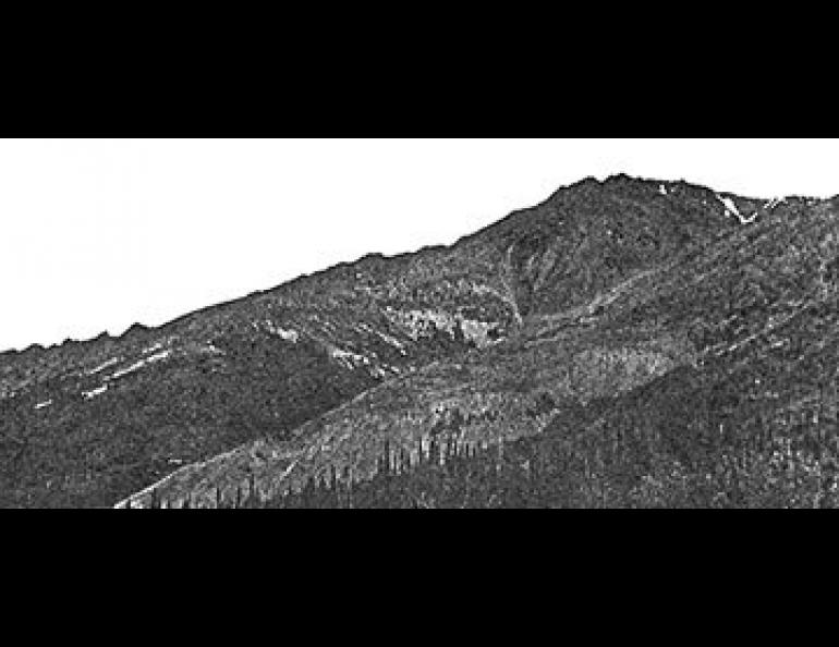 Two views of a mile-long active rock glacier lying just above the Richardson Highway at Mile 207.7. The rock glacier originates in an empty cirque on Rainbow Mountain.