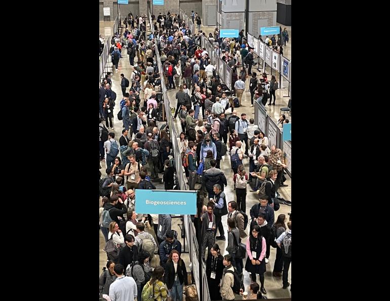 Some of the 25,000 attendees stand at a poster session during the 2024 Fall Meeting of the American Geophysical Union in Washington, D.C. Photo by Ned Rozell.