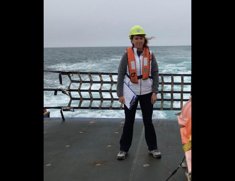 Seismologist Natalia Ruppert stands on the deck of the UAF ship the RV Sikuliaq during a research cruise for the Alaska Amphibious Community Seismic Experiment in July 2018. Photo courtesy Natalia Ruppert.