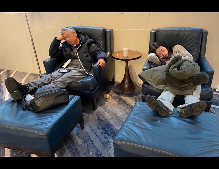 Two attendees of the 2024 Fall Meeting of the American Geophysical Union in Washington, D.C. take a break from its exhausting pace and probably also some jet lag. Photo by Ned Rozell.