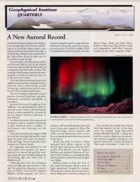 An article on the new auroral record with an image of the northern lights with red and green above a snowy mountain.