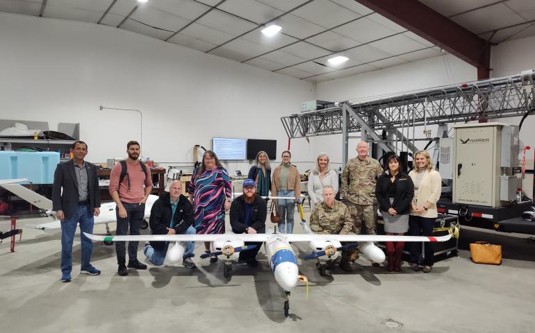 Several participants in the Alaska Defense Forum visited the hangar of the UAF Geophysical Institute’s Alaska Center for Unmanned Aircraft Systems Integration on Monday, Aug. 26, 2024. Tour groups visited several of the university’s research facilities. Photo by Brittany Smart