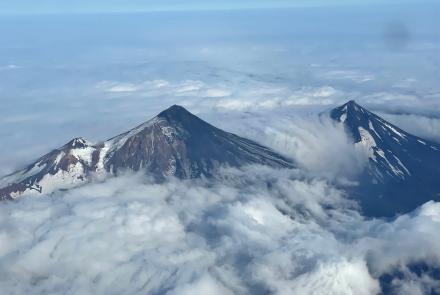 Pavlof Volcano, on the Alaska Peninsula, emerges from clouds on Aug. 20, 2021. Photo courtesy of Ben David Jacob.
