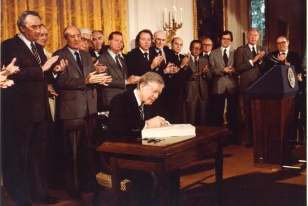 President Jimmy Carter signs the Alaska National Interest Lands Conservation Act on Dec. 2, 1980. Photo courtesy of the Jimmy Carter Presidential Library.